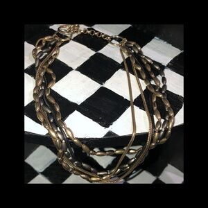 Kenneth Cole Elegant Multi-Strand Gold and Silver Necklace